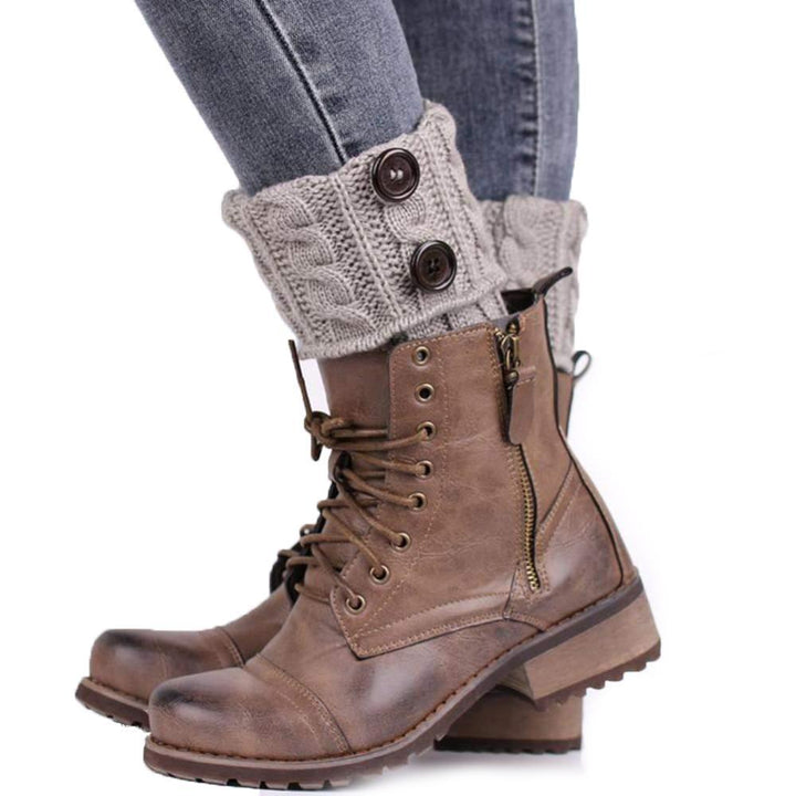 Women's fine gauge knit boot toppers with small, delicate decorative buttons, elegant look