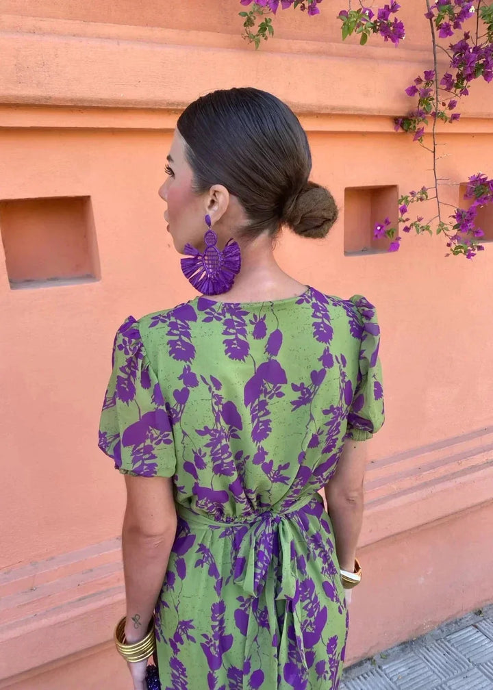 Beautiful women's floral midi dress in green, designed with a wrap V-neckline, puff sleeves. Perfect for summer fashion.