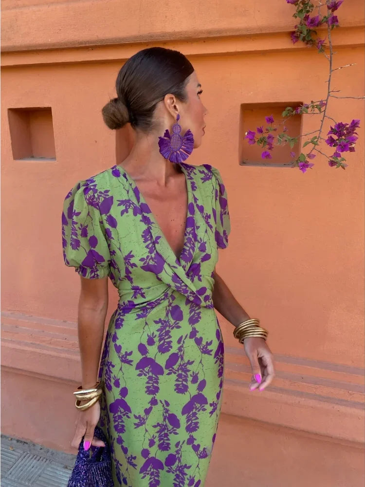 Women's green floral print maxi dress with elegant wrap V-neck, perfect for summer casual or elegant occasions.