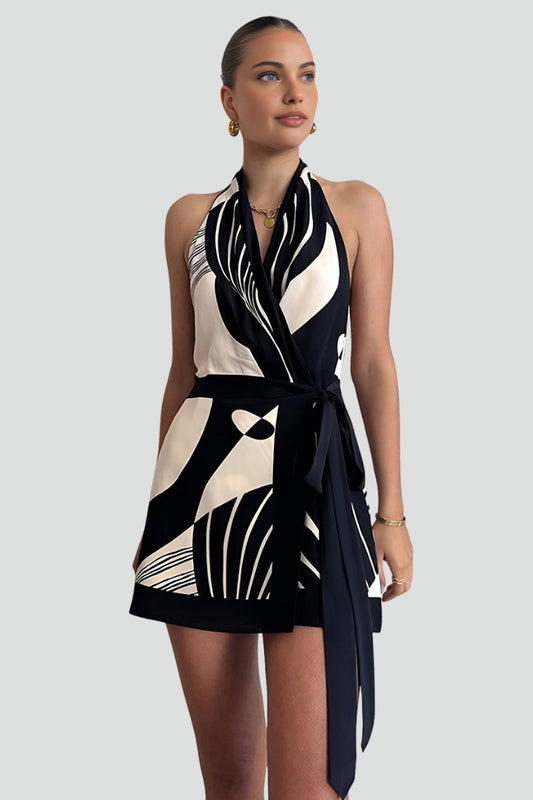 Sleeveless halter neck wrap mini dress for women, featuring a flattering tie waist. A perfect summer casual dress.