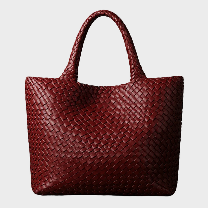 Apricot interlaced woven leather tote for women, a stylish and spacious everyday handbag.