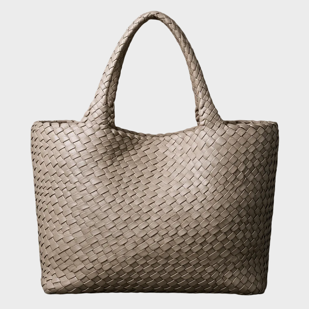 Chic women's cabernet leather handbag with handwoven interlaced design, a spacious shoulder tote.