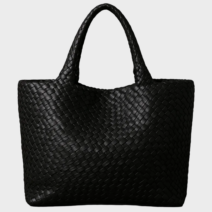 Large capacity women's handwoven leather tote bag in apricot, an artisan shoulder bag for everyday carry.