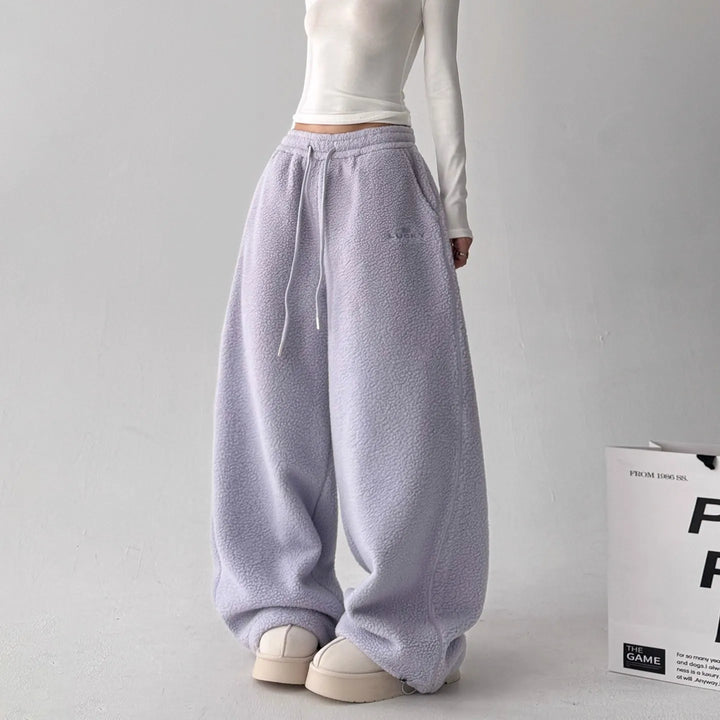 Women's heather gray fleece wide-leg lounge pants, cozy and soft for casual wear or athleisure