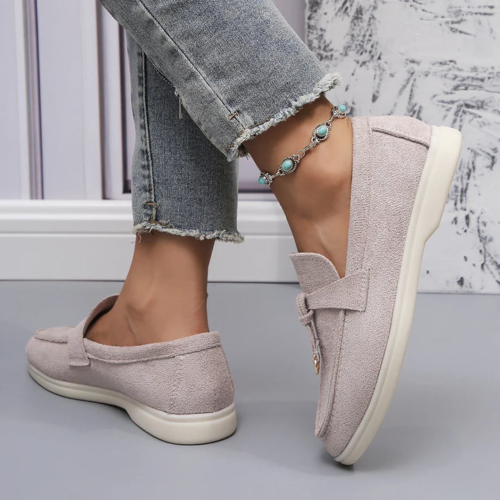 Top-down view of women's light khaki casual fabric loafers, ready for everyday wear