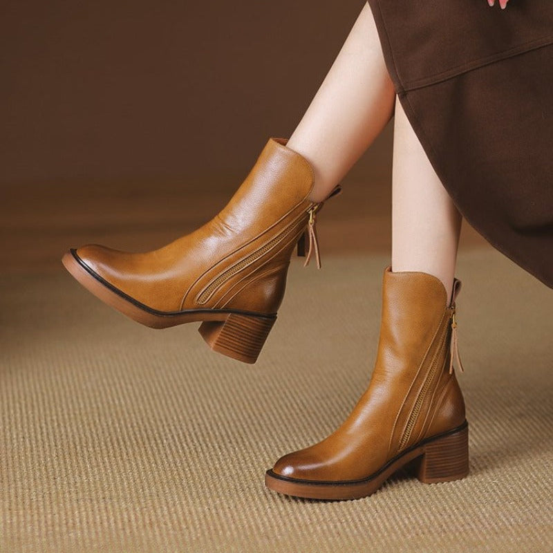 Formal women's high heel ankle boots, perfect for evening wear, with zipper and comfy sole.