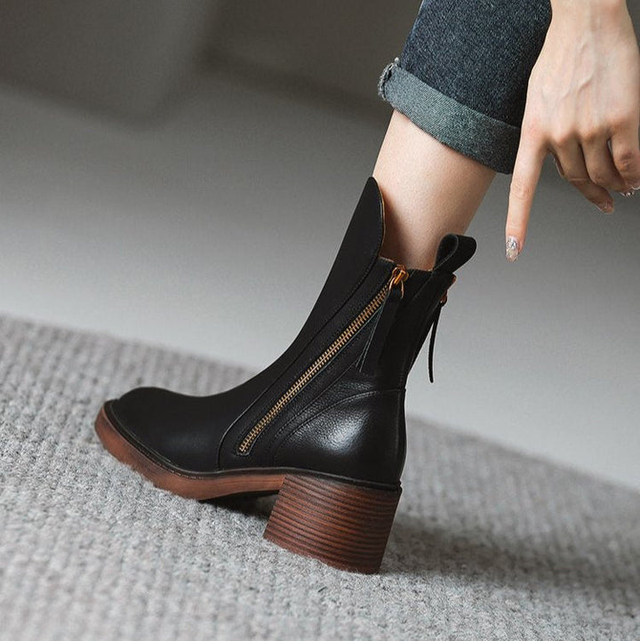 Elegant women's high heel ankle boots with practical zipper & shock-absorbing comfort sole.