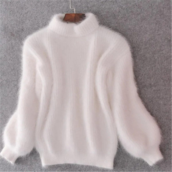 Elegant women's high neck knit sweater in a classic pullover style for warmth and comfort.