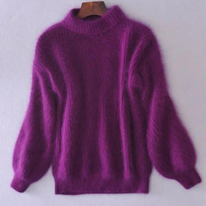 Casual yet chic women's high neck knitwear, ideal as a comfortable winter pullover sweater.