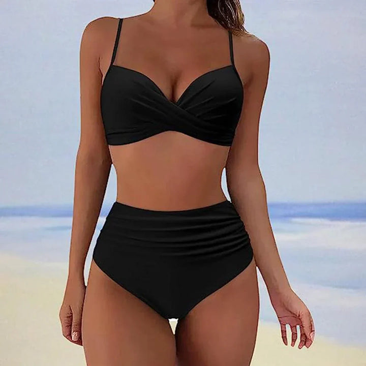 Comfortable women's high-rise bikini swimsuit, two-piece design, ideal for summer beach days & resort lounging.