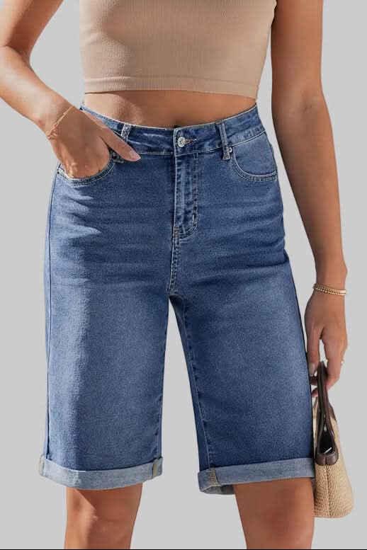 Women's long high-rise shorts paired with a casual top, perfect for summer outings & everyday versatile fashion.