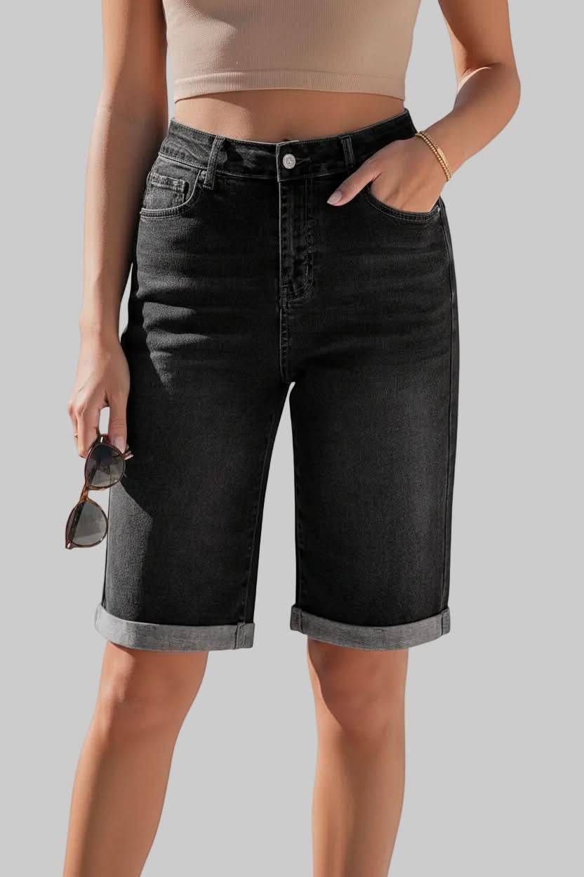 Comfortable women's high-rise long shorts. Relaxed fit for casual summer style and versatile everyday fashion.