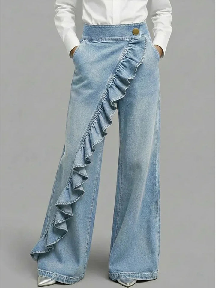 Light blue women's wide leg jeans, high rise with fashionable ruffle detail. Trendy and comfortable fit.