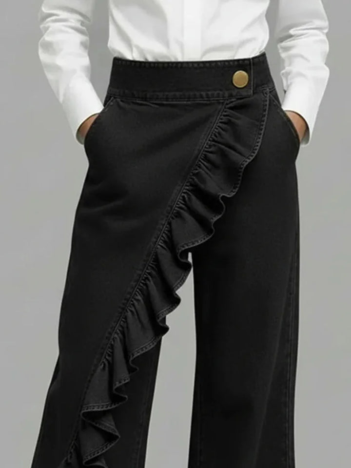 Comfortable women's blue wide leg jeans, high waisted with elegant ruffle details. Casual & stylish.