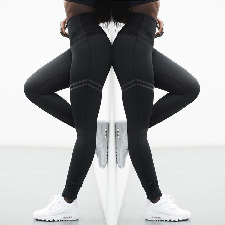 Pair of black anti-cellulite compression leggings, high-waist, ideal for gym and yoga
