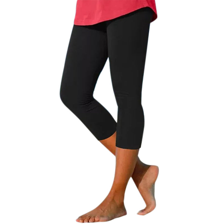 Model wearing comfortable knee-length high waist leggings, ideal for summer activewear
