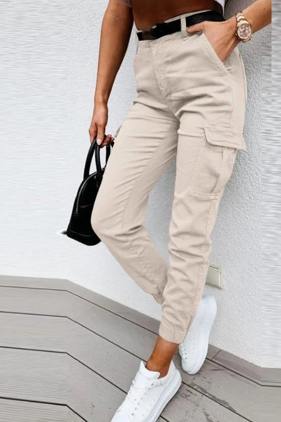 Practical women's high waist cargo jogger pants with ample utility pockets for essentials. Ideal for travel & casual fashion.