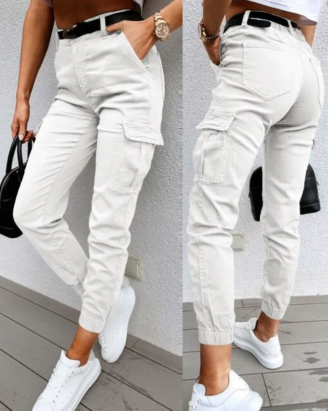 Relaxed fit women's high waist cargo jogger pants with practical utility pockets. Essential for comfortable, trendy streetwear.