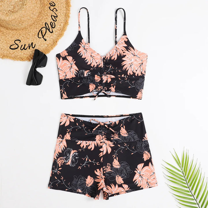 Modern women's high-waist floral bikini set, supportive design for active beach fashion.