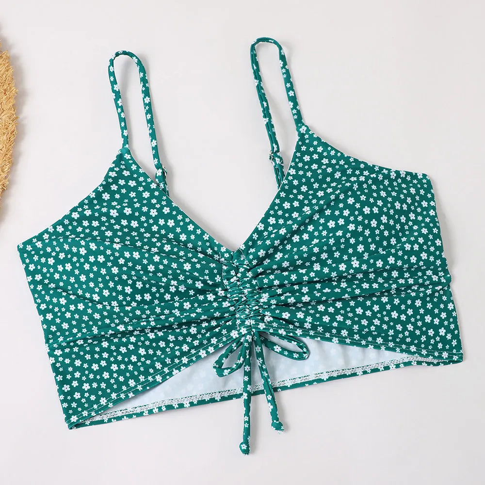 Feminine high-waist floral bikini set, supportive women's swimwear with adjustable straps.