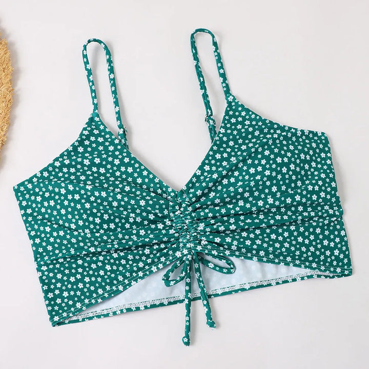 Feminine high-waist floral bikini set, supportive women's swimwear with adjustable straps.