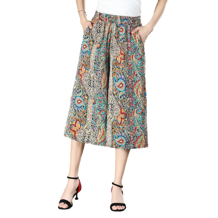 Close-up of the delicate pleating on women's high waist chiffon wide leg culottes