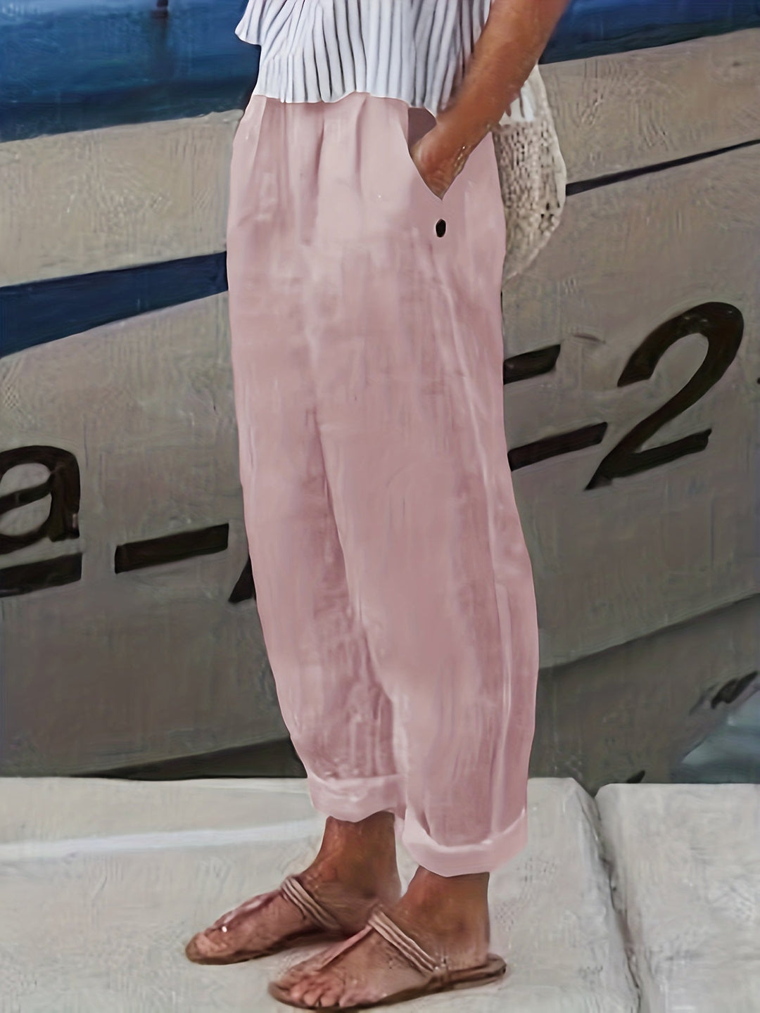 Elasticated waist women's summer pants, high waist & relaxed fit for ultimate comfort.