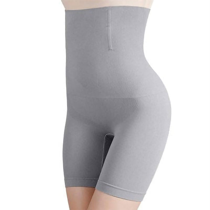 Packaging of the women's tummy control shaper pants, indicating sizing & care instructions