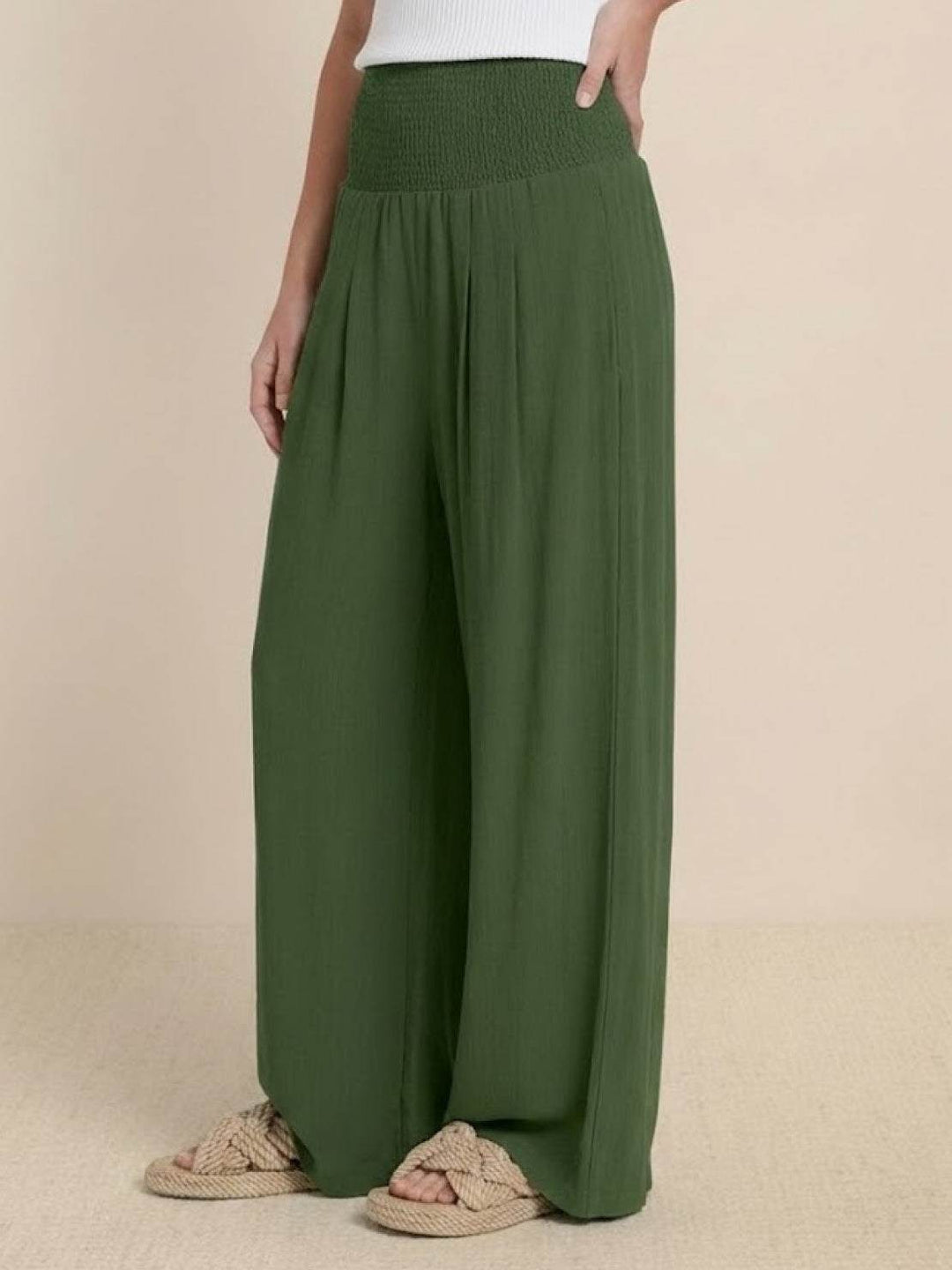 Trendy women's wide leg trousers, high smocked waist design, great for spring and summer.