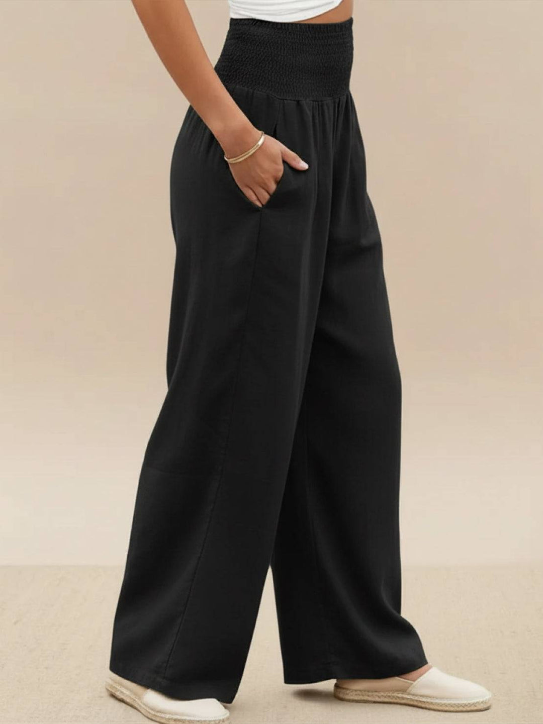 Comfortable women's high waist wide leg trousers, smocked elastic waist for a perfect fit.