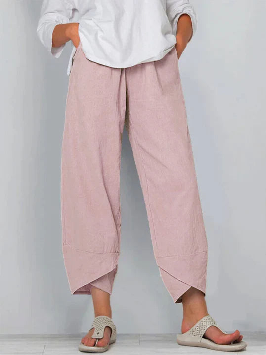 Fashionable women's high-waist wide leg summer pants with a chic tulip hem detail.