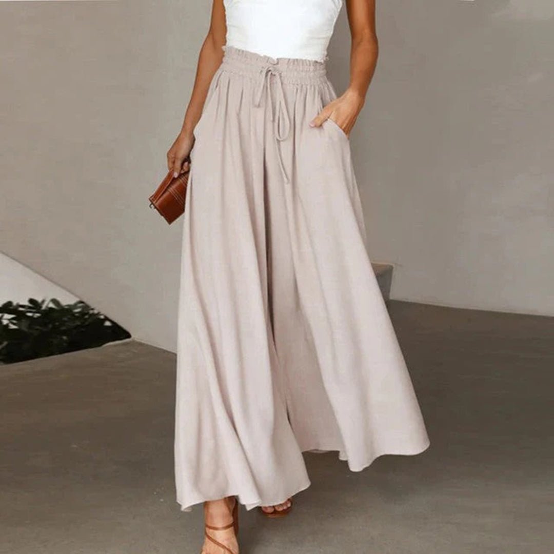 Black high waisted wide leg palazzo pants for women, designed for comfortable and versatile fashion.