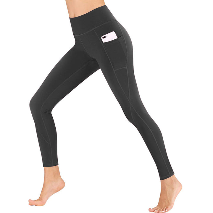 Folded women's high-waisted yoga leggings, highlighting the pocket and premium stretch fabric.
