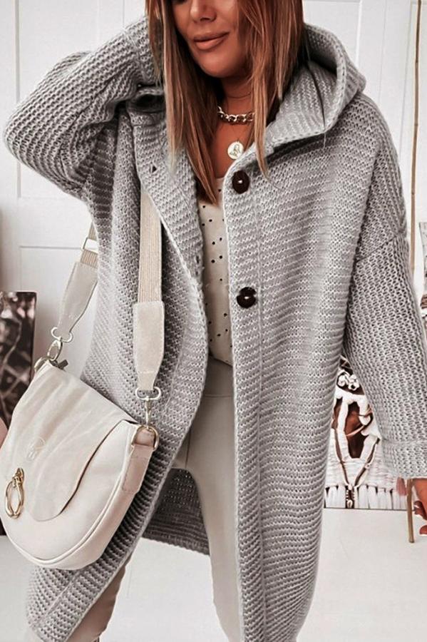Practical button-up knitted hooded vest for women, offering warmth & comfort.