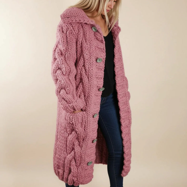 Cozy women's long hooded button-front cardigan, a stylish winter sweater for everyday comfort.