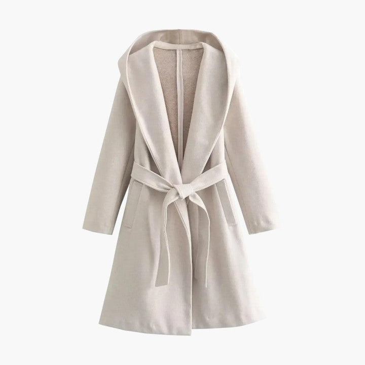 Elegant women's long hooded trench coat. Belted waist and button-front details for versatile styling.