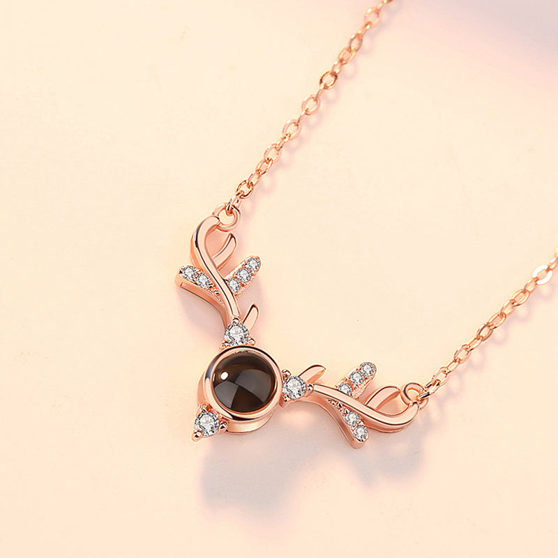Silver alloy 'I Love You' projection pendant, a durable and charming women's necklace.