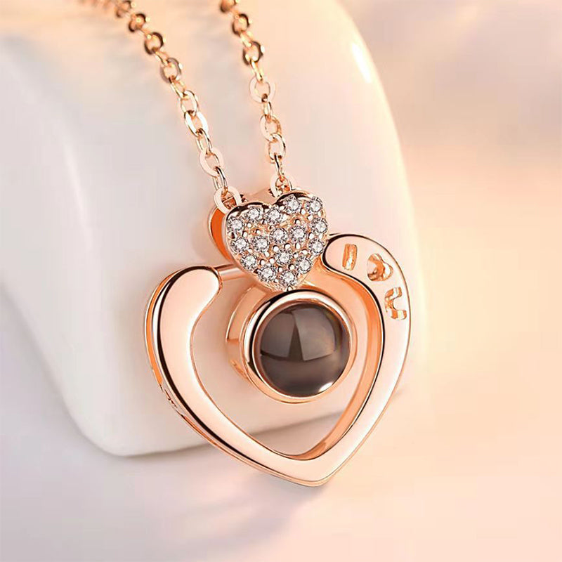 Women's fashionable 'I Love You' projection necklace, made from high-quality rose gold alloy.
