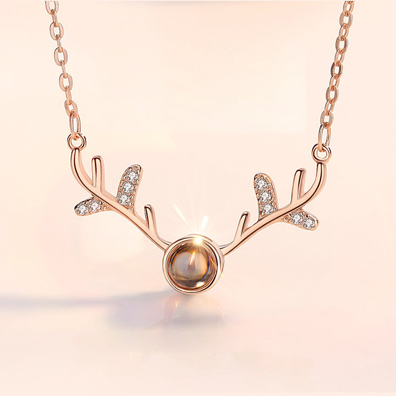 Silver 'I Love You' projection necklace with alloy heart pendant, a charming piece of women's jewelry.