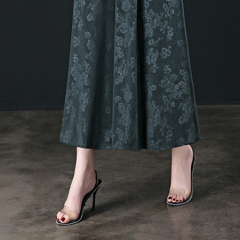 Flowy women's wide-leg palazzo pants made from soft ice silk, perfect for warm weather comfort