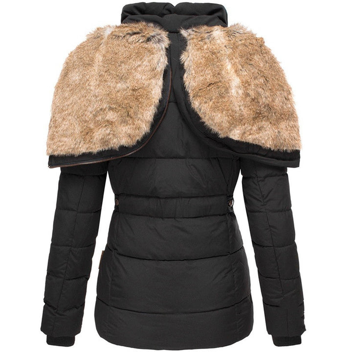 Cozy women's winter jacket for ultimate warmth. Insulated heavy coat, ideal for snow and cold climate.