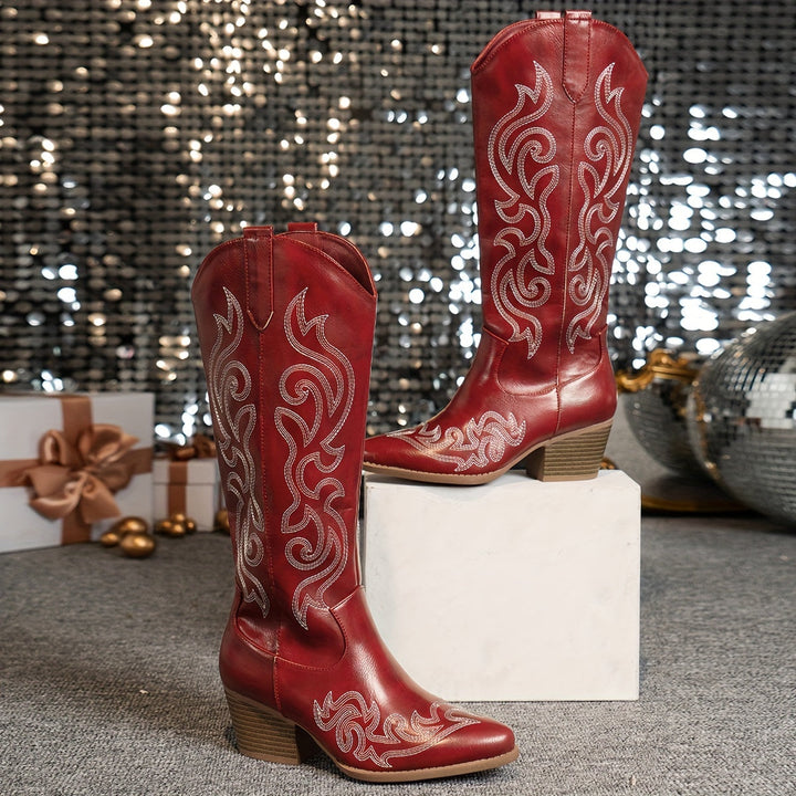 Women's riding style cowboy boots. Knee-high, block heel, pointed toe for a classic western look.