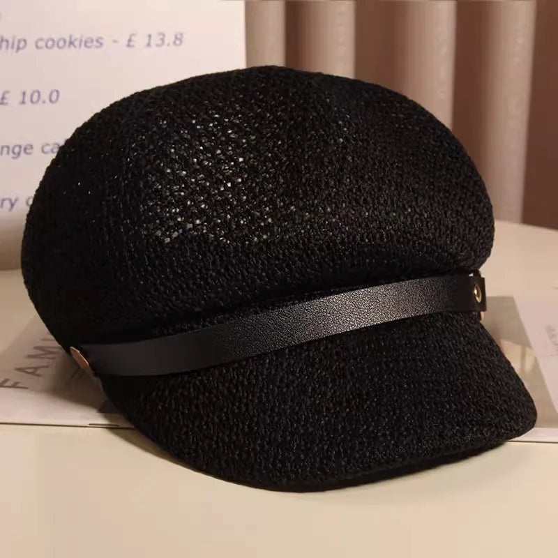 Women's sun hat, knitted and lightweight woven, styled for a relaxed beach or summer look