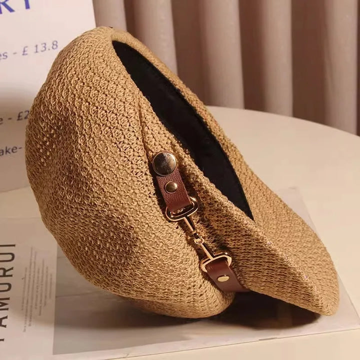 Detail of the brim on a women's knitted sun hat, offering wide sun protection, lightweight woven