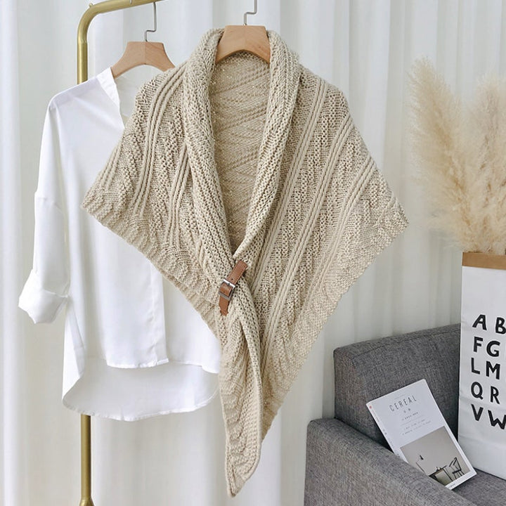 Two women's knitted triangle shawls, different colors, showing variety with buckle