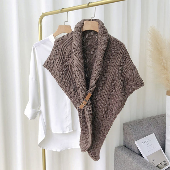 High-quality knitted triangle shawl for women, emphasizing its soft texture and buckle detail