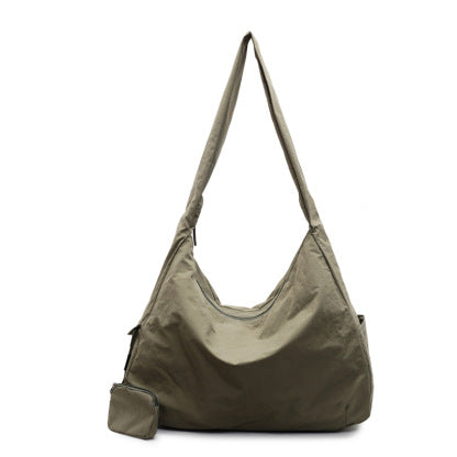Large capacity women's shoulder bag, a fashionable and functional organizer.