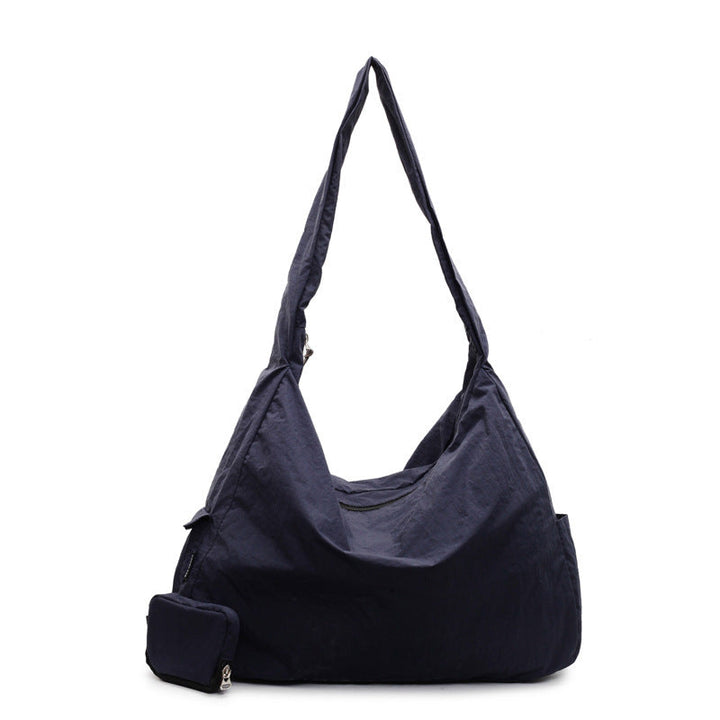 Modern women's hobo shoulder bag, large & versatile, ideal fashion accessory.