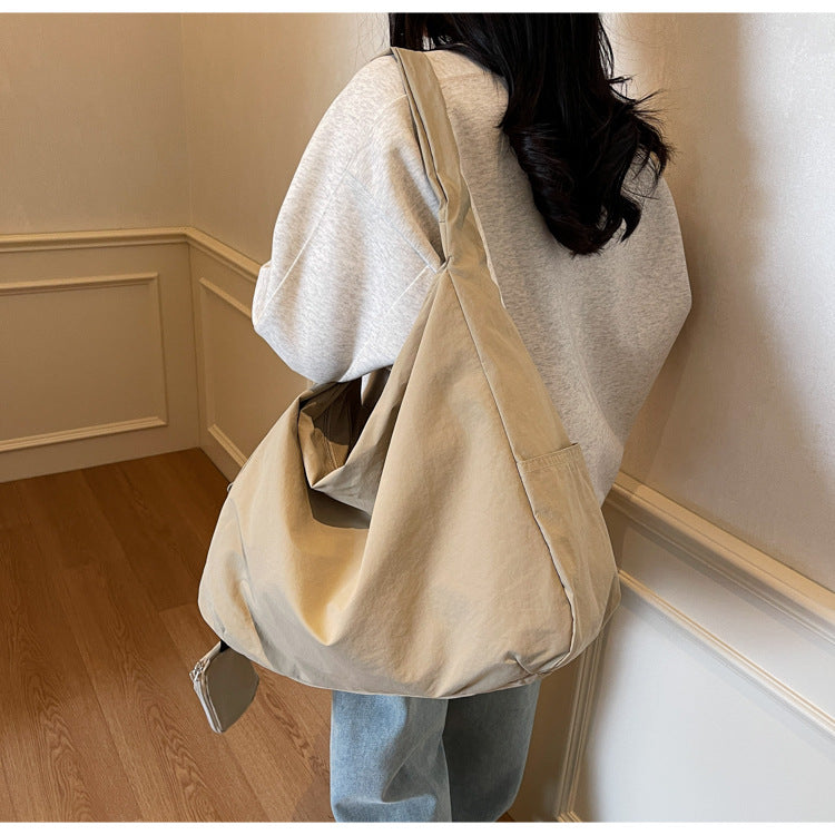 Casual large capacity hobo shoulder bag for women, a practical fashion accessory.