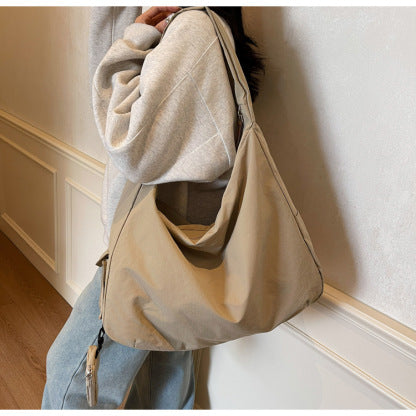 Women's organizer crossbody bag, spacious & stylish for travel or daily use.